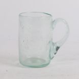 AN 18TH CENTURY GLASS MUG OR TANKARD.