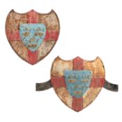 A PAIR OF 19TH CENTURY WROUGHT IRON SHIELDS.