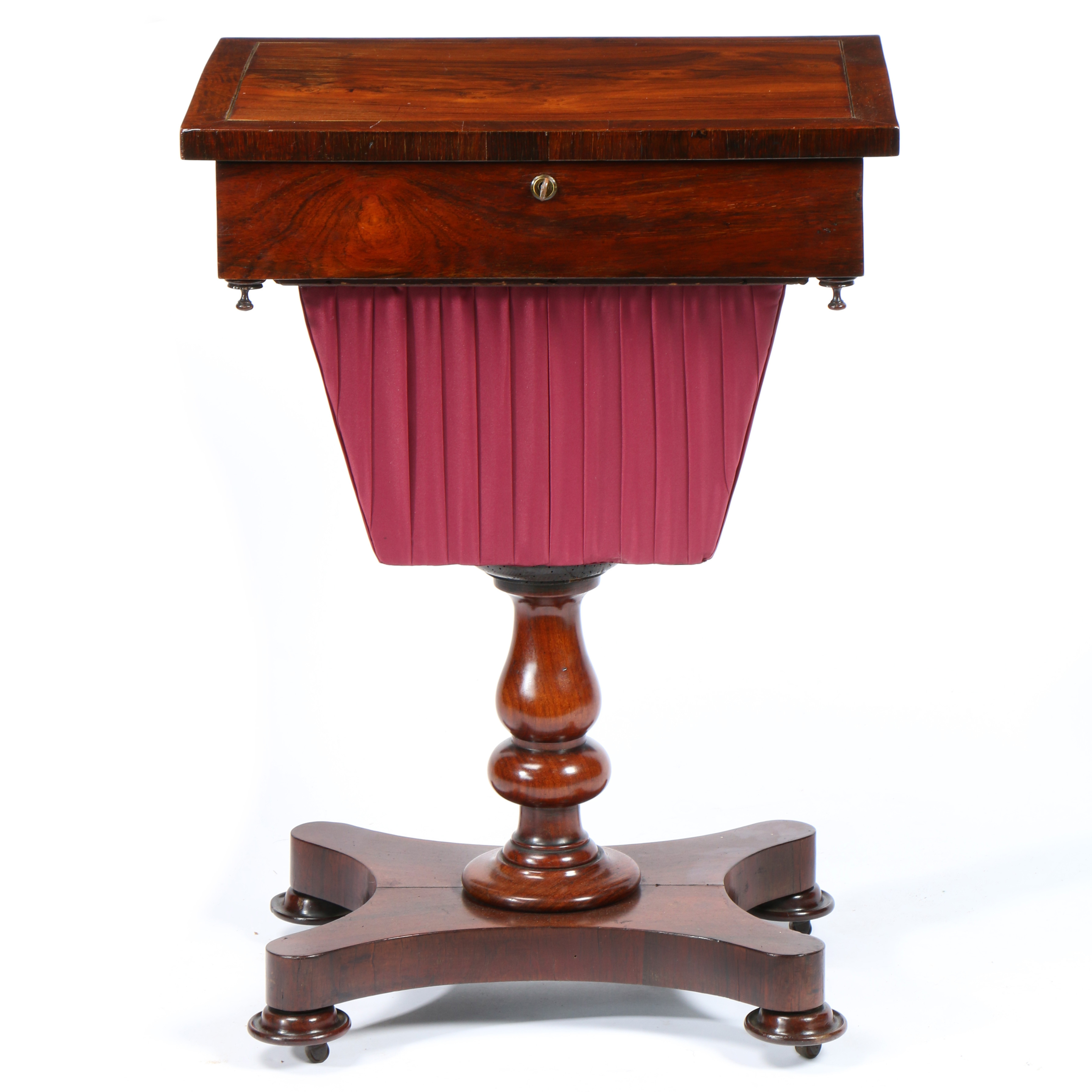 A VICTORIAN ROSEWOOD AND MAHOGANY SEWING TABLE.