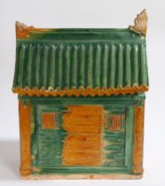 A CHINESE FUNERARY POTTERY MODEL OF A HOUSE, MING DYNASTY.