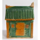 A CHINESE FUNERARY POTTERY MODEL OF A HOUSE, MING DYNASTY.