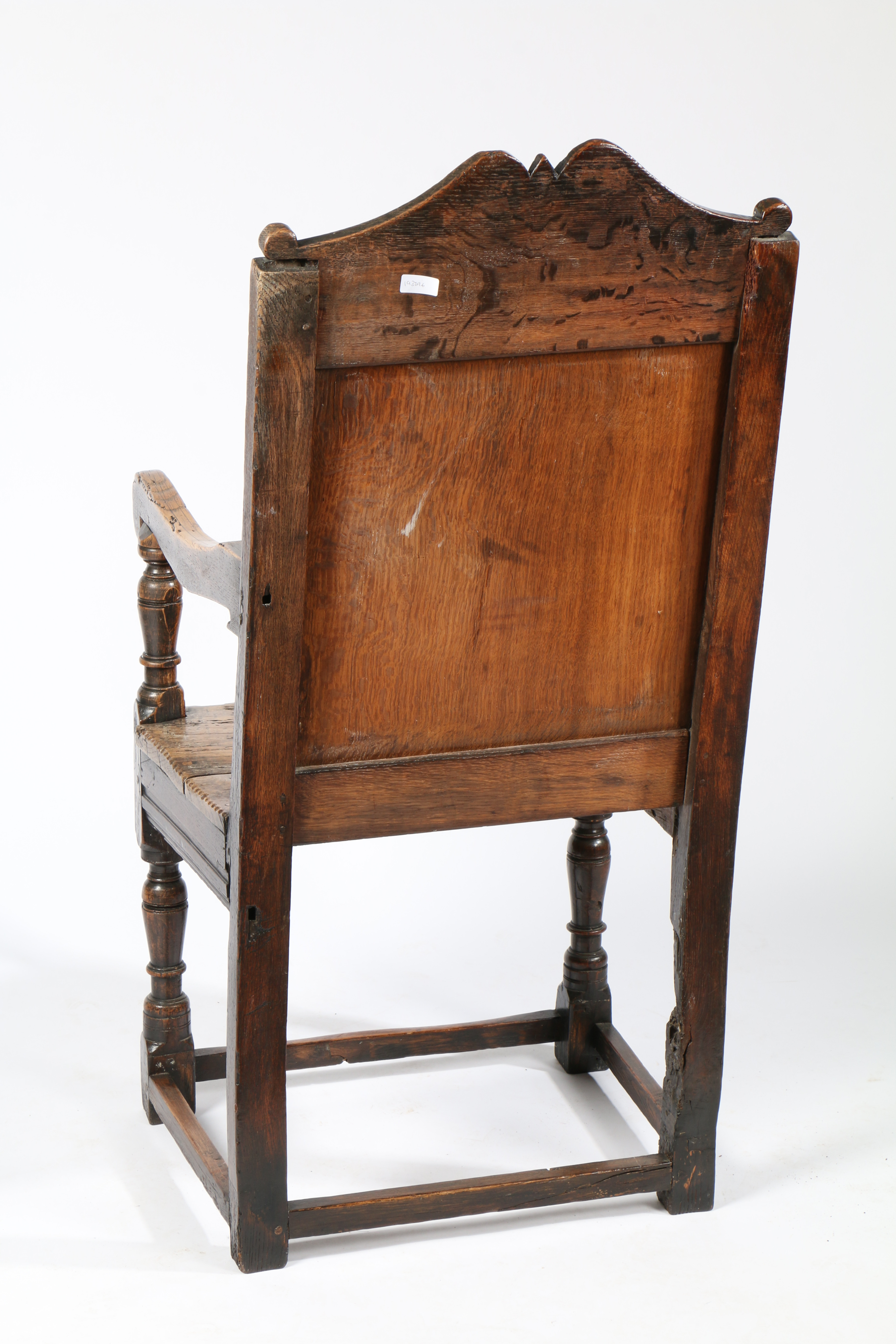 A CHARLES I OAK PANEL-BACK OPEN ARMCHAIR, CIRCA 1640. - Image 4 of 6