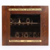 THE AUTOMATIC SPRINKLER CO. LTD., A GLASS FRONTED TRADE DISPLAY BOX.