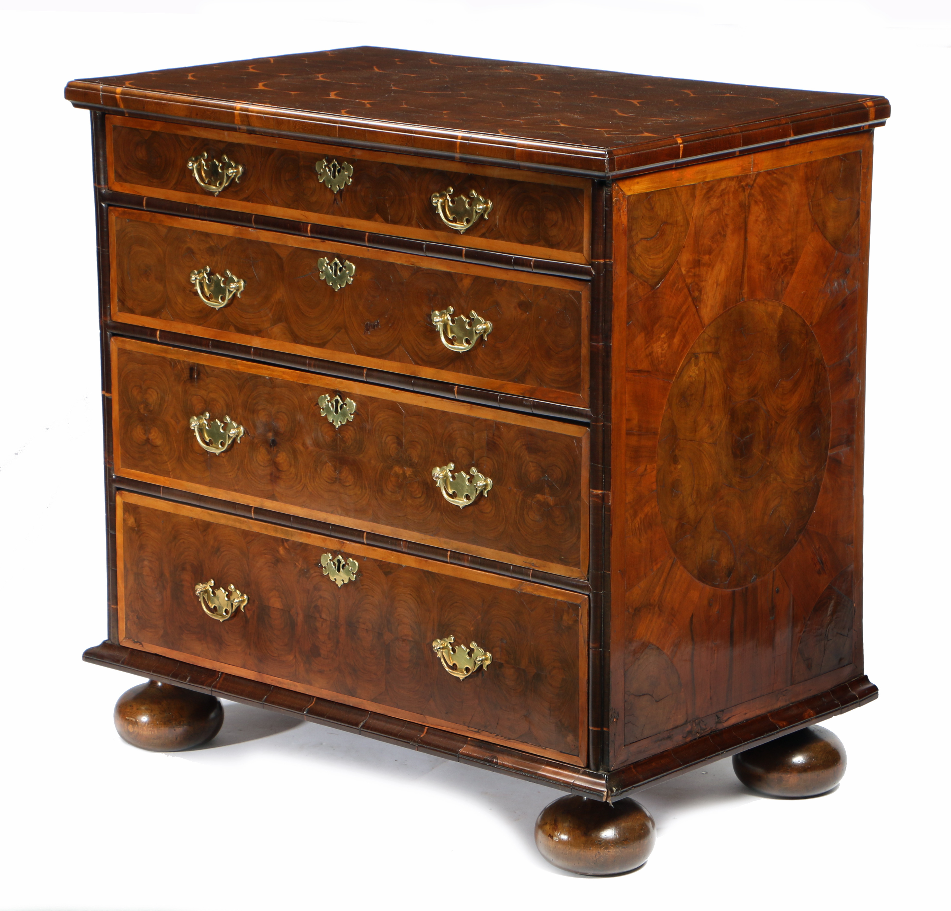 A WILLIAM AND MARY LABURNUM OYSTER VENEERED CHEST OF DRAWERS.
