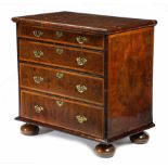 A WILLIAM AND MARY LABURNUM OYSTER VENEERED CHEST OF DRAWERS.