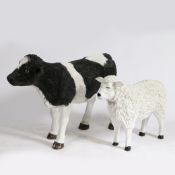 A LIFE SIZE RESIN CALF GARDEN ORNAMENT TOGETHER WITH A LAMB.