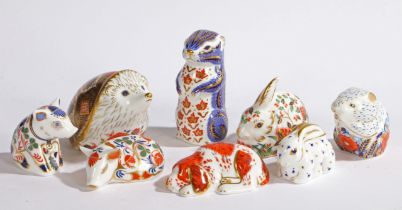 A GROUP OF EIGHT ROYAL CROWN DERBY PAPERWEIGHTS.