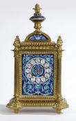 A LATE 19TH CENTURY FRENCH CAST BRASS AND ENAMEL MANTLE CLOCK.