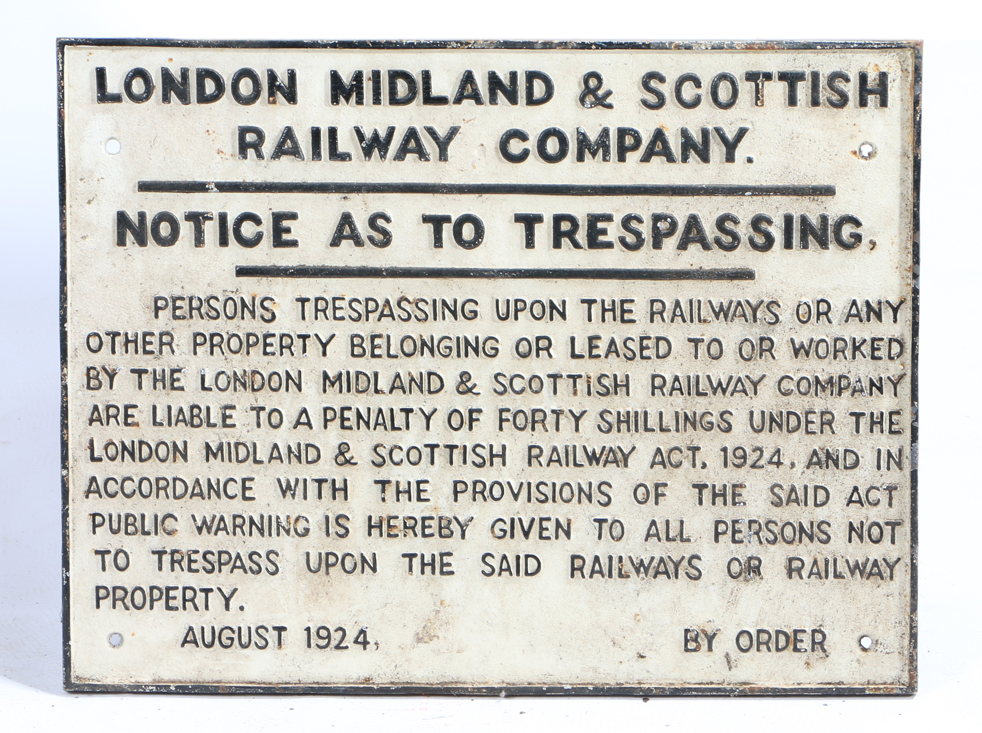 LONDON MIDLAND AND SCOTTISH RAILWAY CAST IRON SIGN.