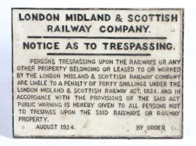 LONDON MIDLAND AND SCOTTISH RAILWAY CAST IRON SIGN.
