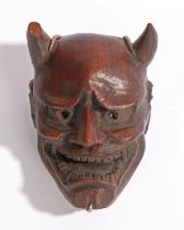 A WOOD MASK NETSUKE, DEME UMAN TENKAICHI ???.