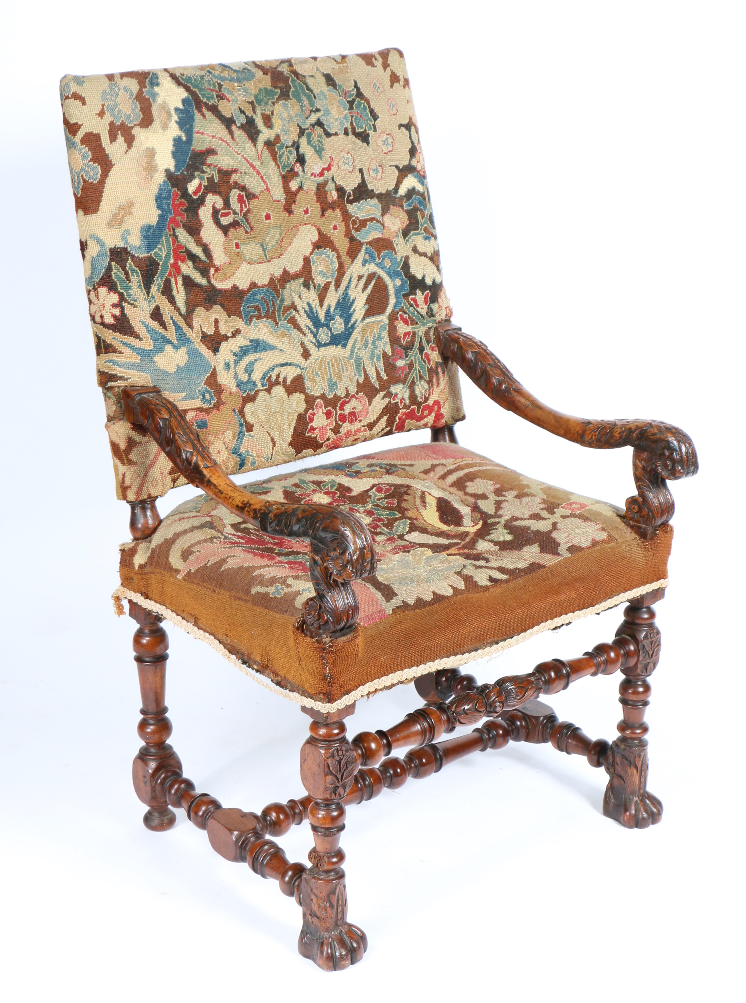 A 17TH CENTURY WALNUT ARMCHAIR.