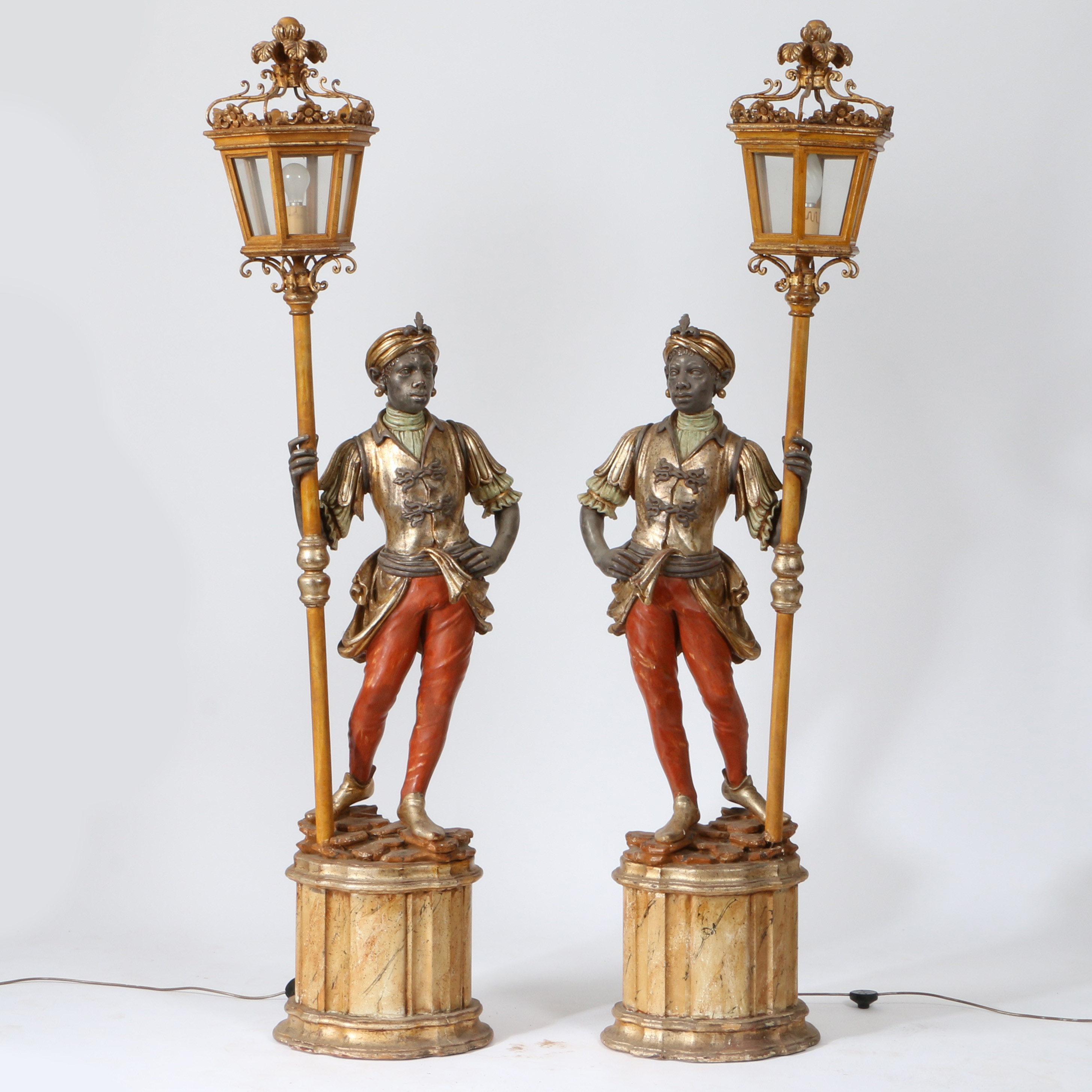 A PAIR OF 20TH CENTURY BLACKAMOOR FLOOR LAMPS.