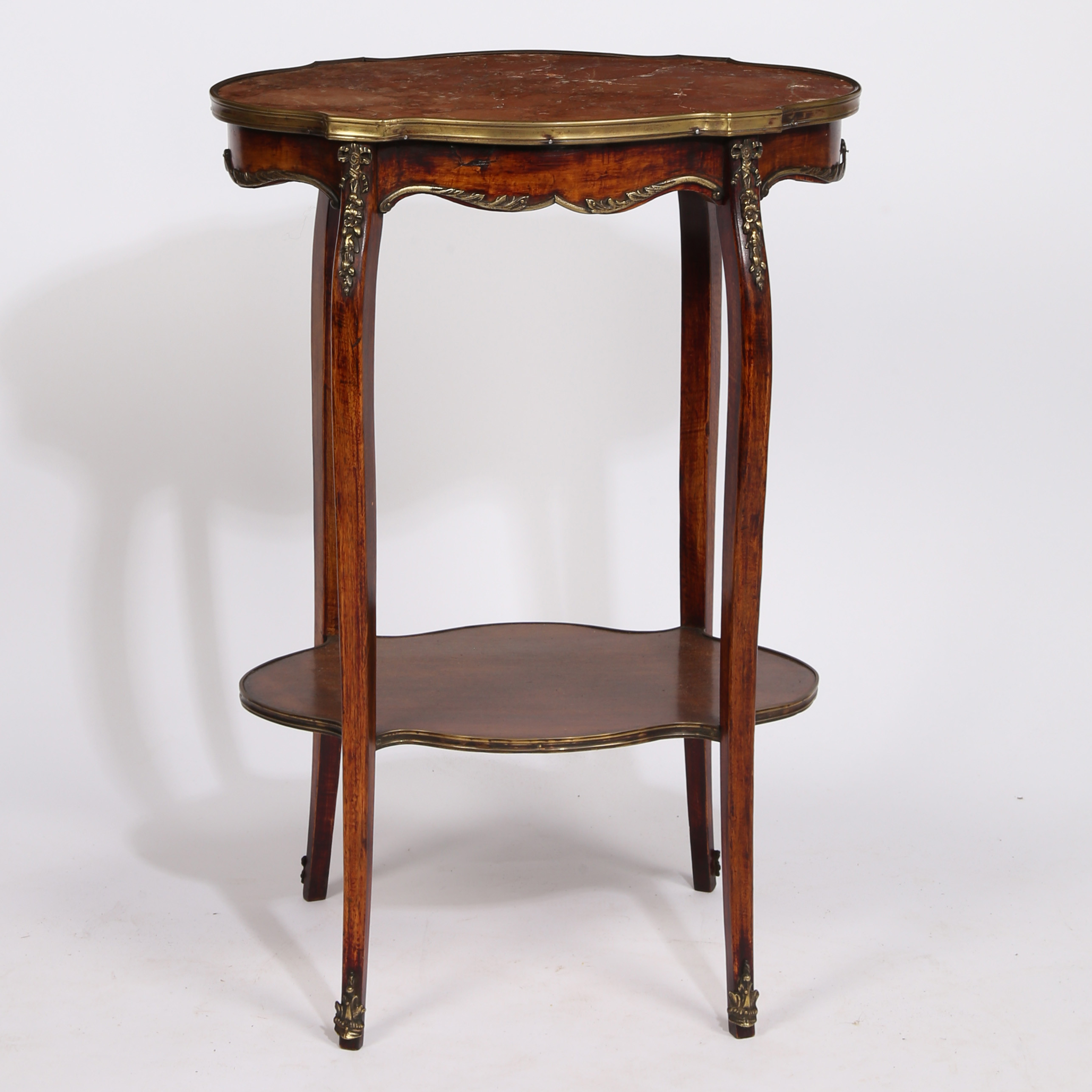 A 19TH CENTURY FRENCH MARBLE TOPPED TWO TIER TABLE.