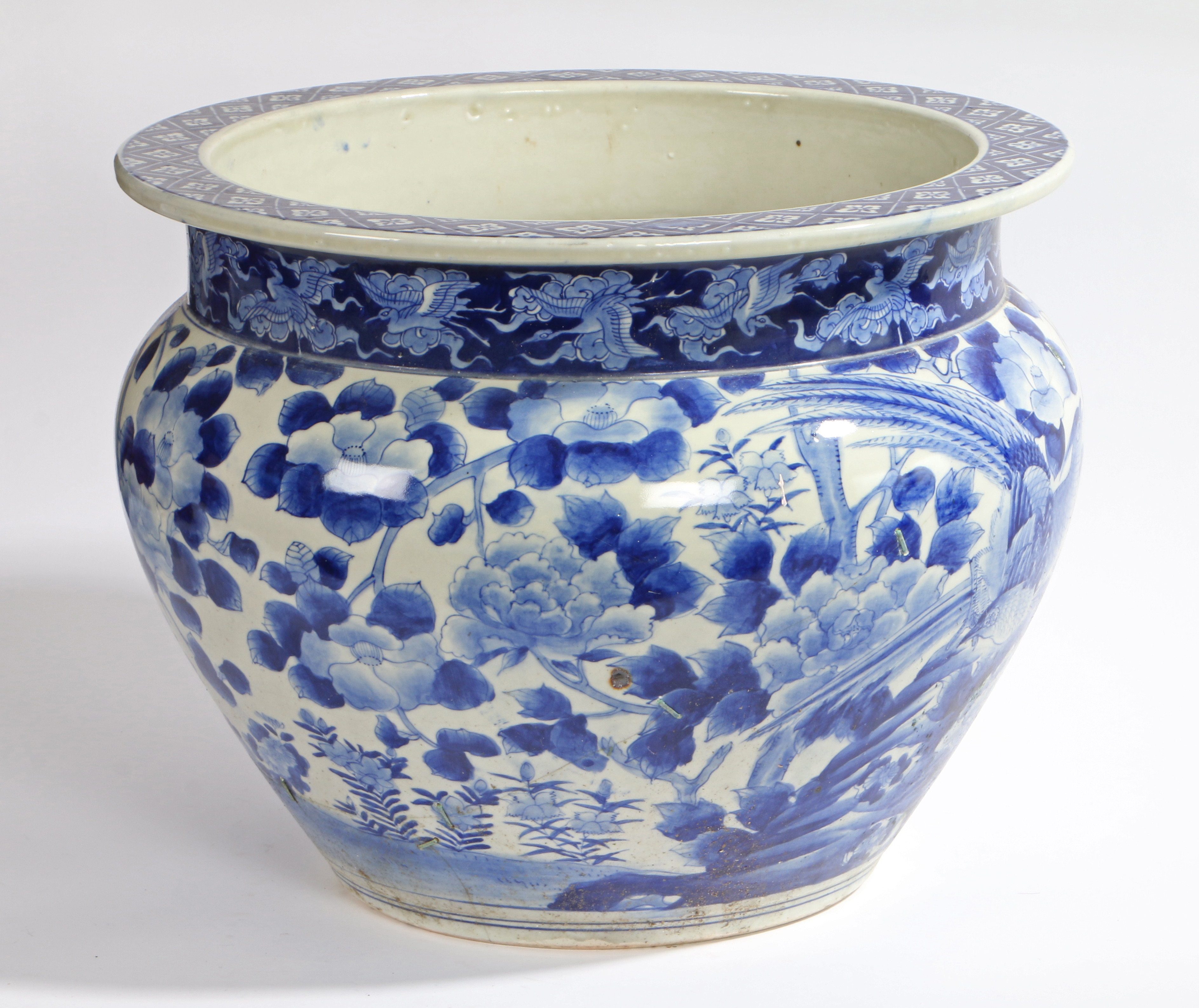 A LARGE JAPANESE PORCELAIN ARITA BLUE AND WHITE FISH BOWL.