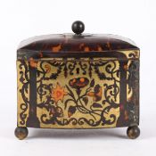 A 19TH CENTURY TORTOISESHELL AND BRASS TEA CADDY.