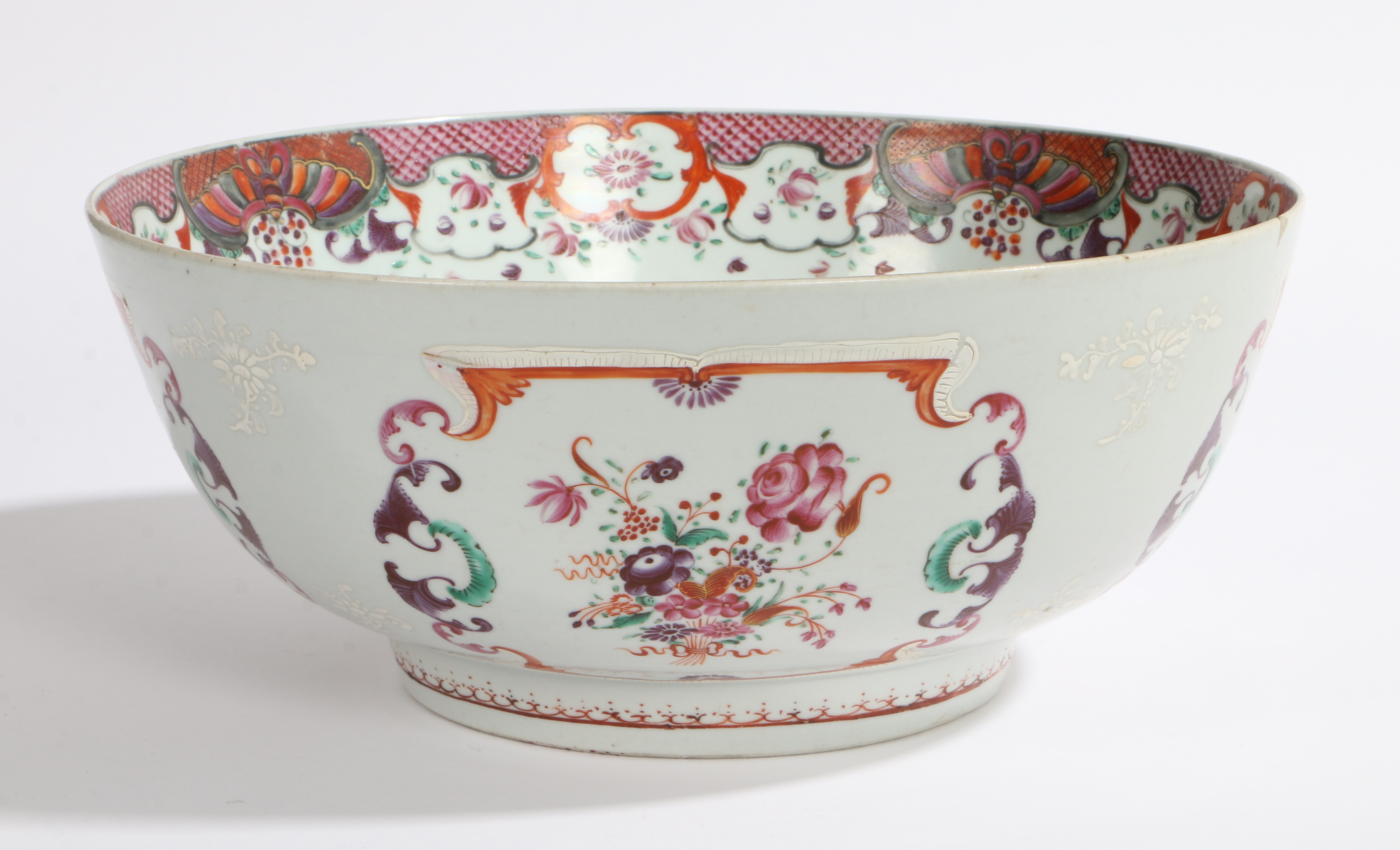 A CHINESE EXPORT FAMILLE ROSE PUNCH BOWL.