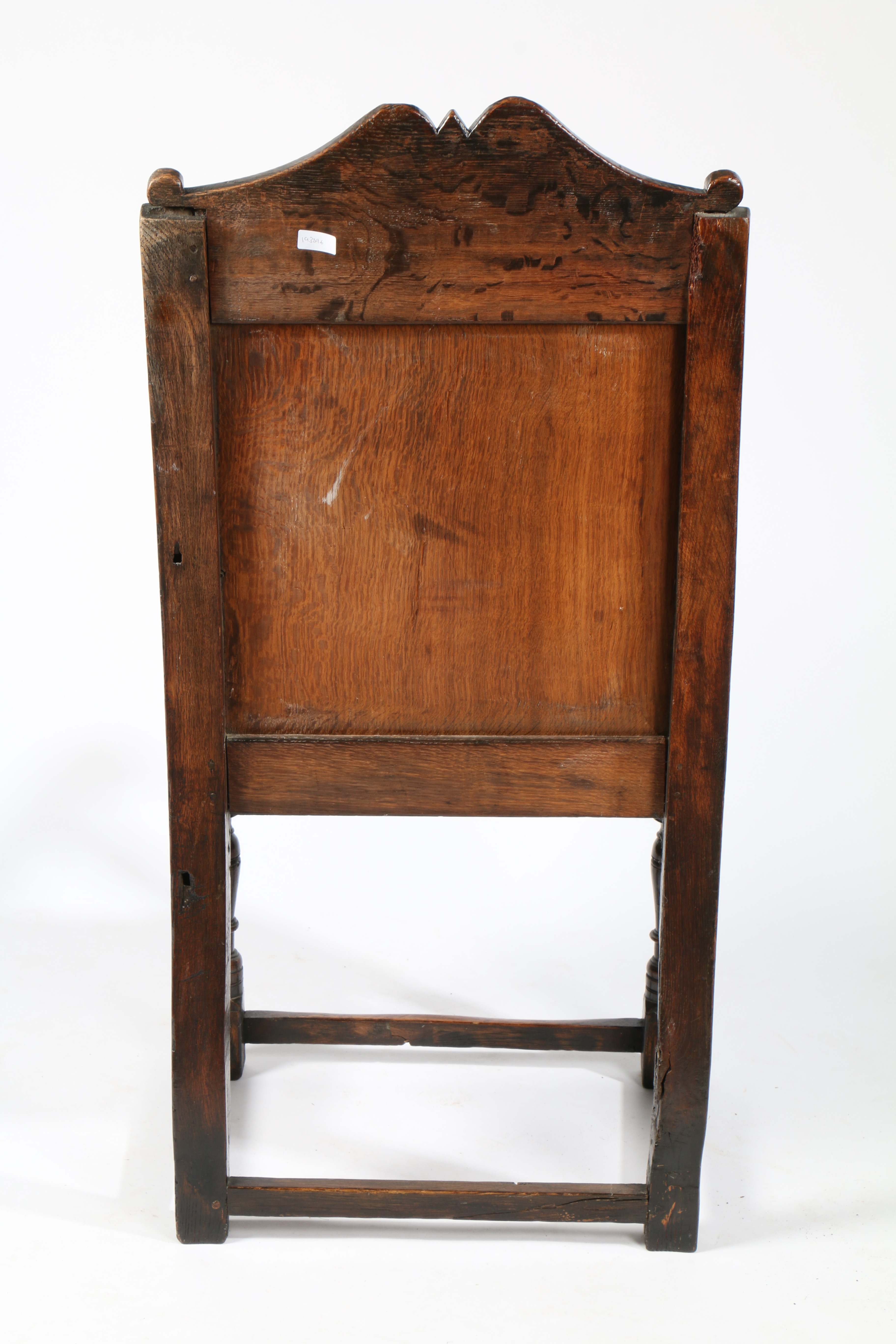 A CHARLES I OAK PANEL-BACK OPEN ARMCHAIR, CIRCA 1640. - Image 5 of 6