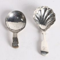 A GEROGE III SILVER CADDY SPOON.