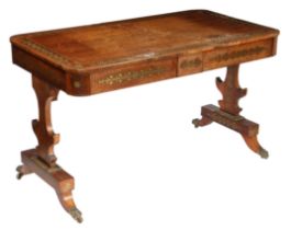 A REGENCY ROSEWOOD AND BRASS INLAID CENTRE TABLE.