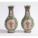 A PAIR OF CHINESE PORCELAIN FAMILLE ROSE CLOBBERED VASES, QIANLONG PERIOD.