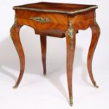 A 19TH CENTURY FRENCH KINGWOOD AND ORMOLU TABLE.