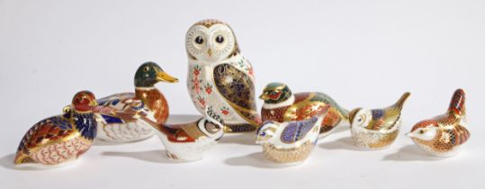 A GROUP OF EIGHT ROYAL CROWN DERBY PAPERWEIGHTS.