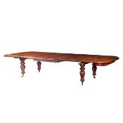 A LARGE WILLIAM IV MAHOGANY EXTENDING DINING TABLE.