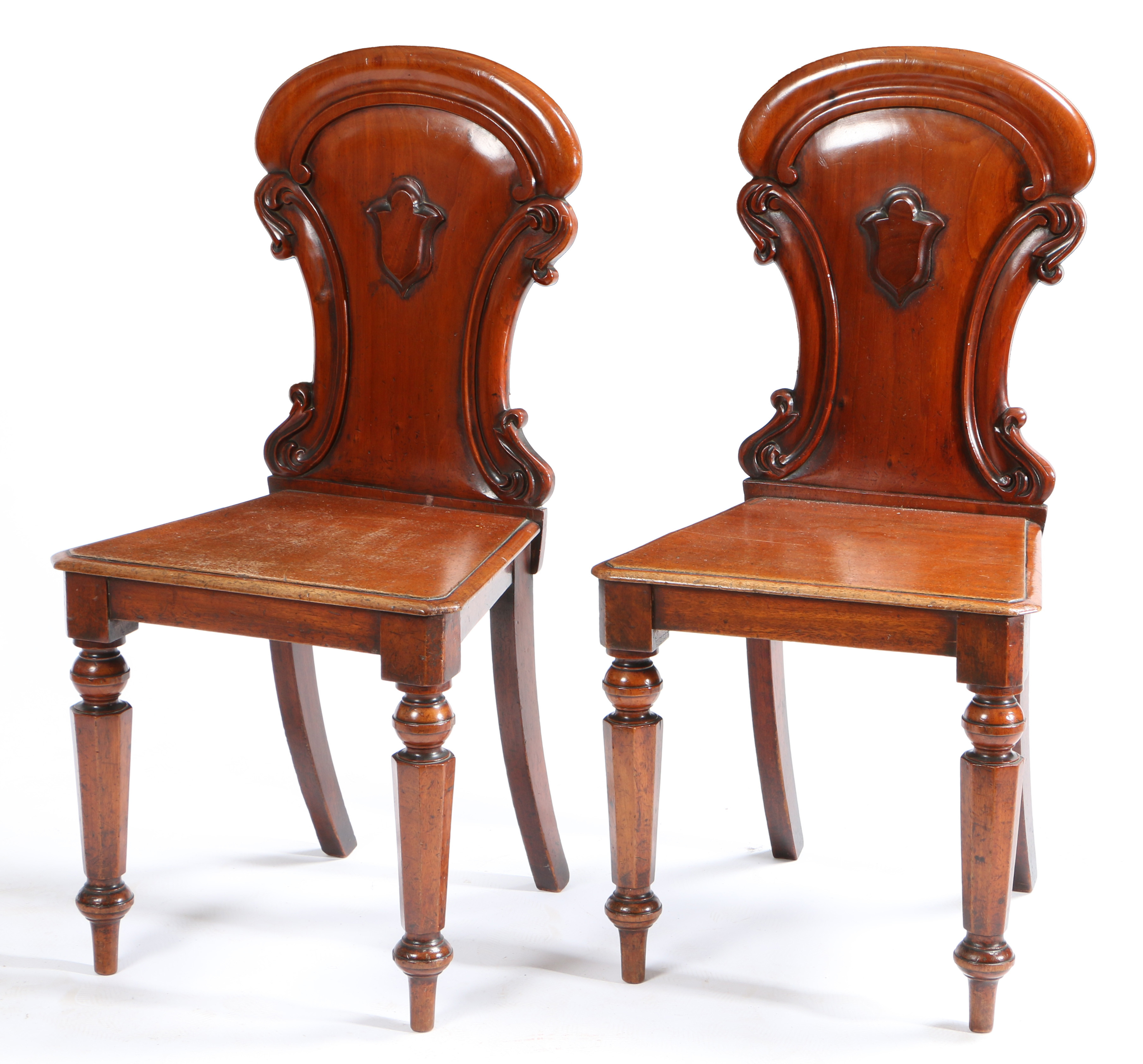 A PAIR OF VICTORIAN ARMORIAL BACK MAHOGANY HALL CHAIRS ATTRIBUTED TO W. BLACKIE. - Image 2 of 3