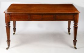 A 19TH CENTURY OAK LIBRARY TABLE.