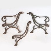 A SET OF CAST IRON BENCH ENDS.