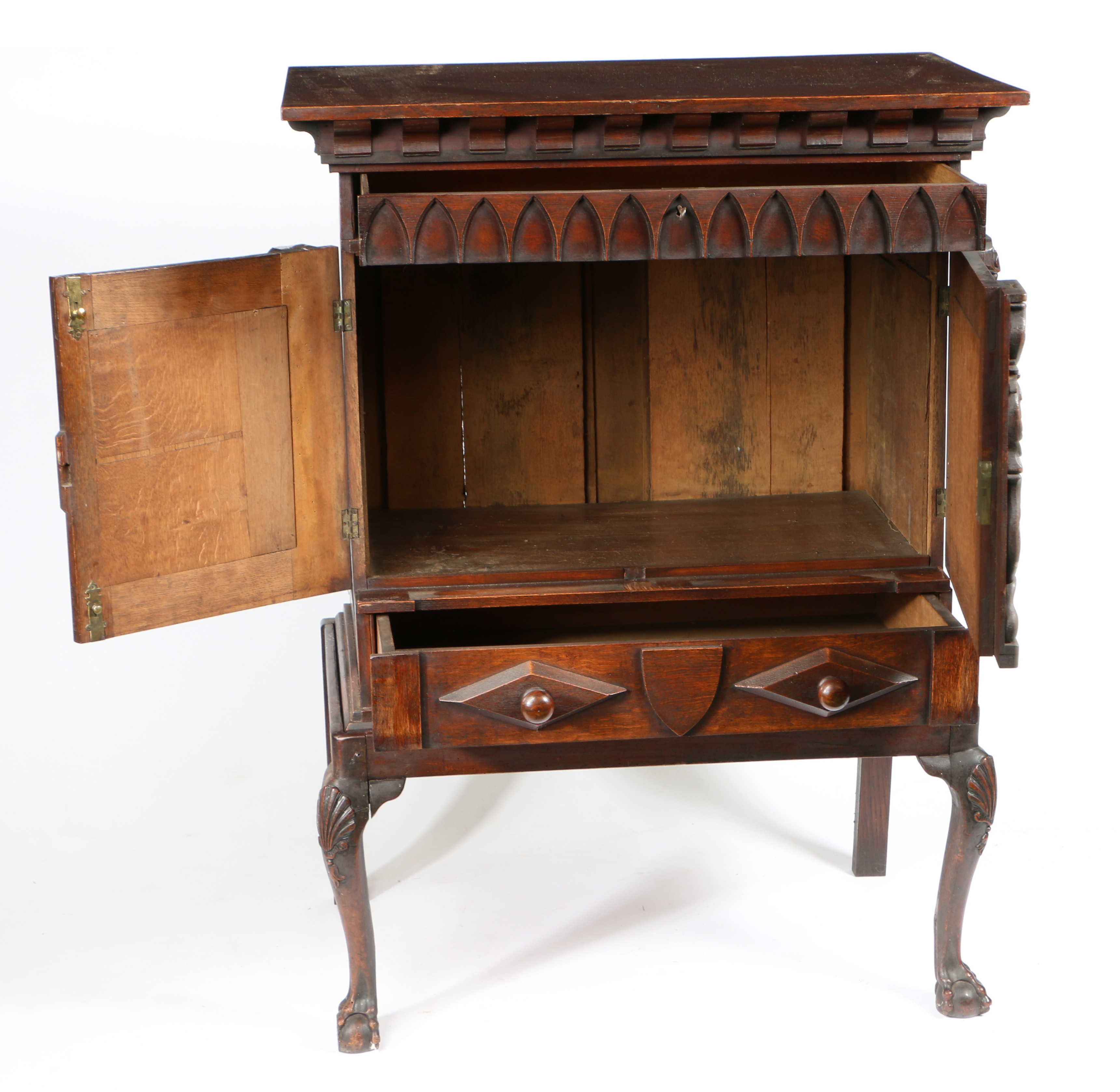 A 19TH CENTURY CARVED OAK CUPBOARD ON STAND. - Image 2 of 2