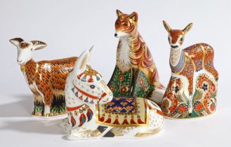 A GROUP OF FOUR ROYAL CROWN DERBY PAPERWEIGHTS.