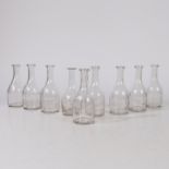 A NEAR SET OF NINE LATE 19TH CENTURY AMERICAN MEDICINE BOTTLES.