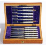 AN EDWARDIAN CASED SET OF SILVER AND MOTHER OF PEARL KNIVES AND FORKS.