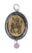 A FRENCH GLASS, SILVER AND PARCEL-GILT DEVOTIONAL MEDALLION SECOND HALF 17TH CENTURY.