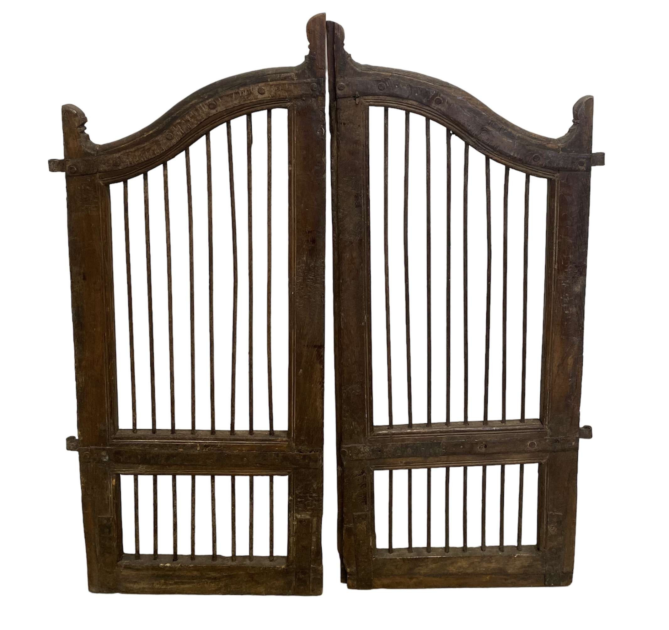 A PAIR OF INDIAN SWINGING SALOON DOORS.