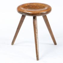 A 19TH CENTURY SYCAMORE STOOL.