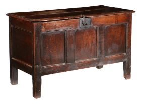 A CHARLES II OAK COFFER, CIRCA 1660.