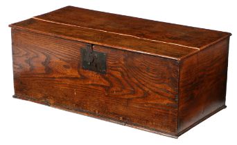 AN EARLY 18TH CENTURY STAINED PINE BOARDED CHEST.