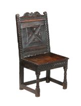 A CHARLES I OAK BACKSTOOL, CIRCA 1640.