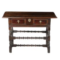 A CHARLES II OAK SIDE TABLE.