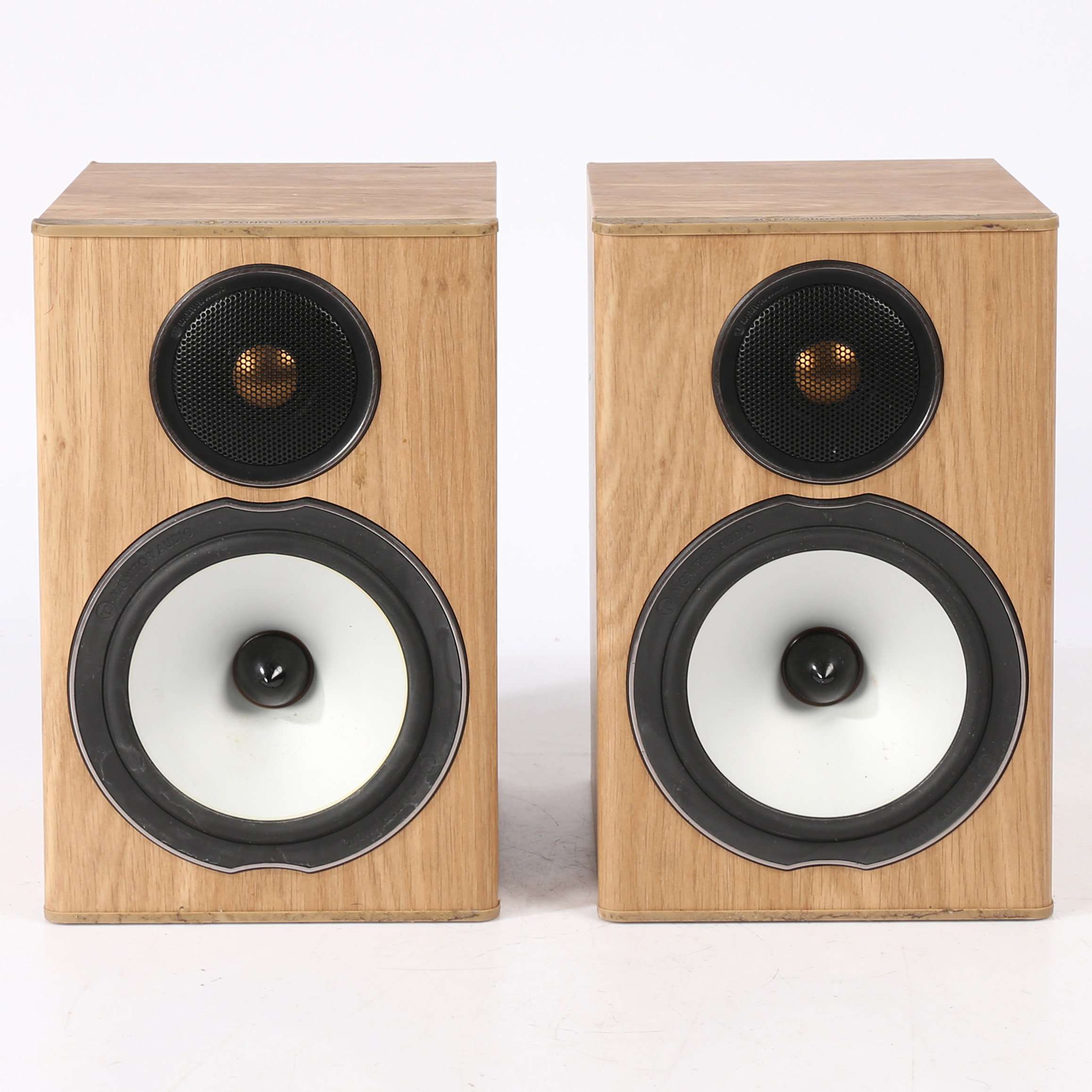 A PAIR OF MONITOR AUDIO BRONZE BX1 SPEAKERS.