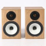 A PAIR OF MONITOR AUDIO BRONZE BX1 SPEAKERS.