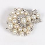 AN ART DECO DIAMOND AND PEARL BROOCH.