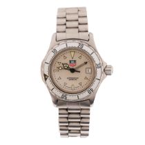 A TAG HEUER PROFESSIONAL 200 METERS LADIES STAINLESS STEEL WRISTWATCH.