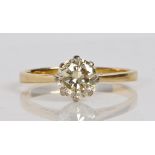 AN 18 CARAT GOLD SOLITAIRE RING.