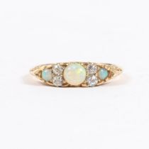 A VICTORIAN 18 CARAT GOLD, OPAL AND DIAMOND RING.