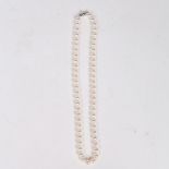 A SINGLE STRAND PEARL NECKLACE.