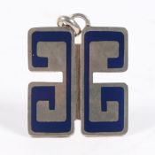 A GUCCI SILVER AND BLUE ENAMEL PENDANT.
